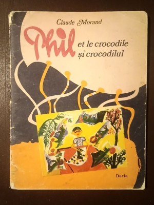 Claude Morand - Phil et le crocodile. Phil și crocodilul (ediție bilingvă; ilustrații de Oana D&amp;icirc;rjan &amp;amp; Imola Szentpeteri) foto
