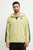adidas geacă Essentials culoarea galben, de tranzitie, IM7847