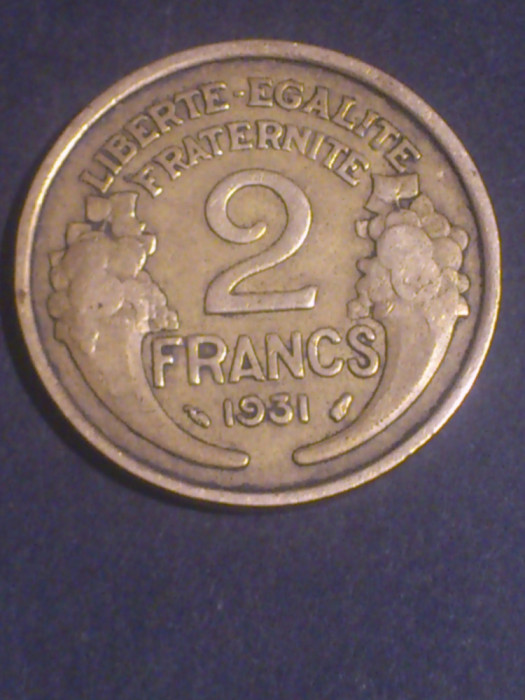 2 francs franci 1931, aUNC (AU55),RARA (T:1.717.000). Discount de 10 % pt achizitii cumulate in valoare de minimum 160 de lei.