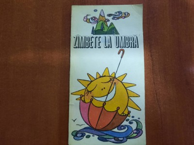 Zambete la umbra foto