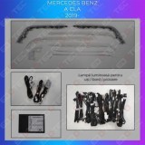 Lumini Ambientale trimuri usi picioare 64 de culori Mercedes A W177 CLA W118 control pe sistemul original sau telefon CarStore Technology