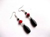 Cercei howlite rosu si negru 31997
