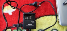&Icirc;ncărcător Nikon MH-23 pentru acumulator camera foto .