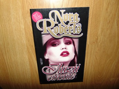 Nora Roberts - Iluzii Cinstite foto