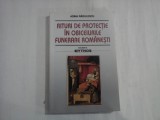 RITURI DE PROTECTIE IN OBICEIURILE FUNERARE ROMANESTI - ADINA RADULESCU