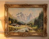 Peisaj montan, lucrare semnată realizata &icirc;n tehnica ulei pe lemn, &icirc;ncadrat &icirc;ntr-o ramă decorativă aurită, stil Baroc