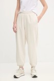 Puma pantaloni de trening femei, culoarea bej, neted, 629753