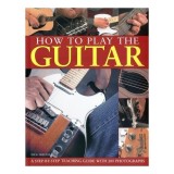 Cumpara ieftin How to Play the Guitar