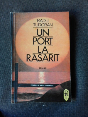 UN PORT LA RASARIT - RADU TUDORAN foto