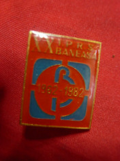 2 Insigne IPRS Baneasa la 10ani- 1972 si 20 Ani-1982,h=2,5cm ,metal si email foto