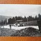 Fotografie masina de epoca pe drumuri de munte, perioada interbelica