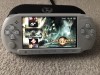 PlayStation PSP E1004 60 jocuri Modat 64Gb Husa incarcator GTA GOD OF WAR STAR WARS CULOARE ALB