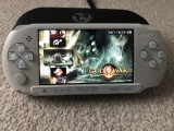 PlayStation PSP E1004 60 jocuri Modat 64Gb Husa incarcator GTA GOD OF WAR STAR WARS CULOARE ALB