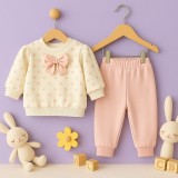 Cumpara ieftin Set bebelusi crem cu buline si fundita + pantaloni roz &ndash; 2 piese moi si