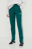 Cumpara ieftin Adidas Originals pantaloni de trening culoarea verde, cu imprimeu IP0628