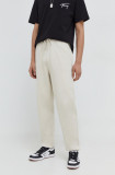 Tommy Jeans pantaloni de trening din bumbac culoarea bej, uni DM0DM18378