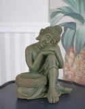 Budha din polystein YAC027, Religie