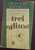 TREI OGLINZI - Mircea Horia Simionescu