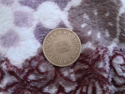 Vand moneda de 50 de bani din anul 2006. foto