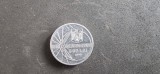 Moneda de 500 lei cu eclipsa de soare din 1999