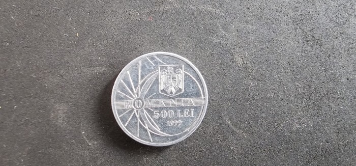 Moneda de 500 lei cu eclipsa de soare din 1999