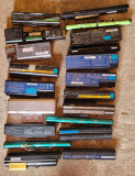 Lot 20 de baterii laptop - cu carcasa deteriorate