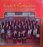 Disc vinil, LP. THE TRIPLE CHAMPIONS-THE BRIGHOUSE AND RASTRICK BRASS BAND-265724, Polydor