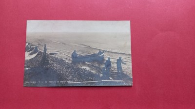 Dobrogea Constanta Grup de pescari la malul marii foto