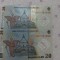2 Bancnote de 20 robi cu serii consecutive