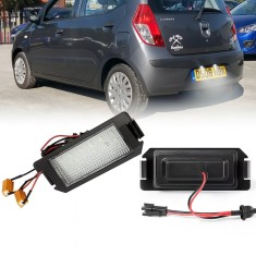 Set 2 Lampi LED Numar Inmatriculare Auto pentru Hyundai I10 I20 Ioniq si Kia Rio 3 UB Picanto Soul &ndash; Alb Xenon 6000K, Canbus Fara Eroare, 18 LED-uri,