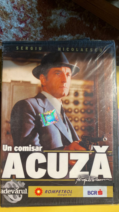 UN COMISAR ACUZA,DVD SIGILAT cu HOLOGRAMA