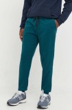 Rip Curl pantaloni de trening barbati, culoarea verde, neted