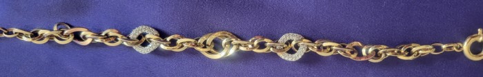 Bratara aur galben 14K model cu inele si cu doua decoruri batute cu zirconii