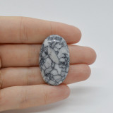 Cabochon pinolith 35x21x5mm c19