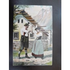 Carte postala barbat si femeie in costum traditional, inceput de secol XX
