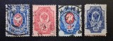 Imperiul Rus 1909&ndash;1917 - Set de 4 Timbre Uzuale Clasice Heraldice &bdquo;Stema Imperială / Vulturul Bicefal&rdquo; -PV1
