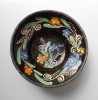 Farfurie de perete / blid, ceramica din Transilvania decorata cu floare