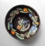 Farfurie de perete / blid, ceramica din Transilvania decorata cu floare