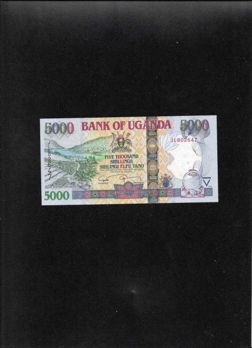 Rar! Uganda 5000 5.000 shillings 2009 seria802647 unc
