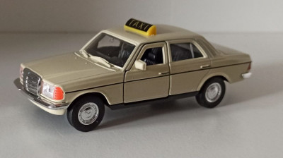 Macheta Mercedes E Class W123 Taxi (Cobra)- Welly 1/36 foto