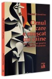 Carte: Omul care a muscat un caine - Roman de Daniel Ernestina