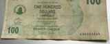 BNKSTR1 (Serie rara 555) Zimbabwe - 100 Dollars (Cec la purtător / Bearer Cheque), Ediția 1 August 2006