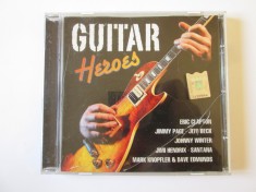 CD Guitar Heroes &icirc;n stare bună cu carcasa crăpată
