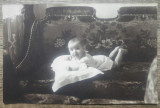 Copil pe pernuta// foto tip CP, Paduraleanu Foto-Art Buzau, Romania 1900 - 1950, Portrete