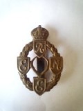 Insigna militară WW2 - British Army Royal Electrical and Mechanical Engineer cap badge s
