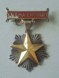 Ordinul Titlul de Mama Eroina, model R.P.R., prima varianta cu steaua din aur și placa din argint.