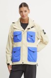 The North Face geaca TNF x Yinka Ilori femei, culoarea bej, de tranzitie, NF0A89GC3X41