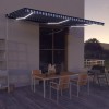 VidaXL Copertină retractabilă manual cu LED albastru &amp; alb 600x300 cm