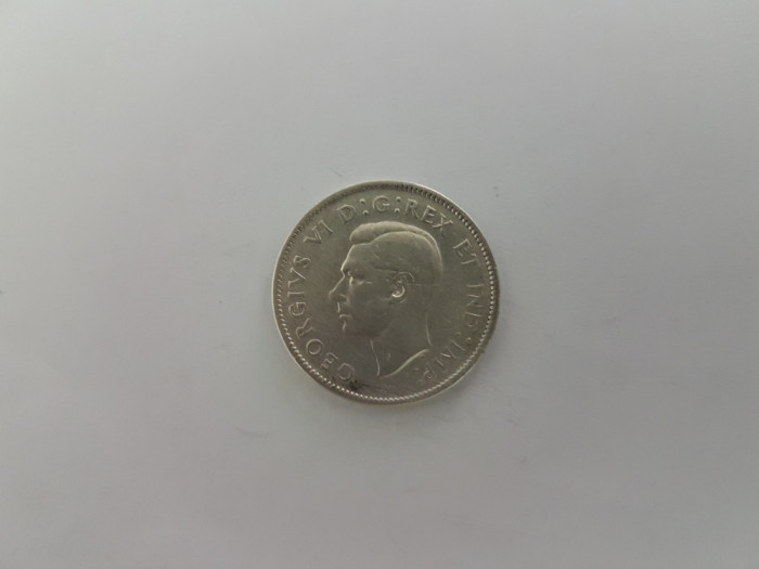 Canada 25 Cents 1944 Argint are 6 gr.