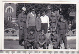 Bnk foto Grup de militari in fata garii Ramnicu Sarat 1965, Alb-Negru, Romania de la 1950, Cladiri